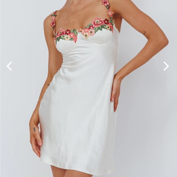 Selfie Leslie Dresses & Skirts - White satin mini dress with flower strap details!